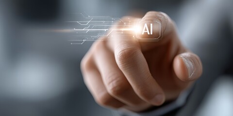 Hand of a business professional interacting with a digital interface, pressing an illuminated button labeled AI, showcasing technology and innovation in a modern workspace