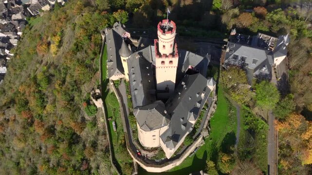 Marksburg Castle on a Hill near to Rhine River in Early Autumn. Braubach in Rhineland Palatinate, Germany. Aerial view.