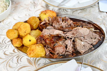 Lamb meat served on plate in restaurant. 