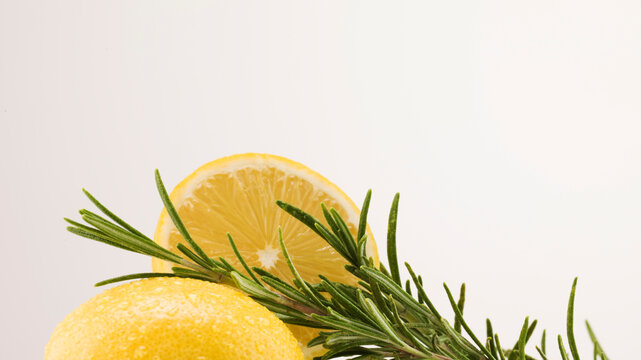Still life of lemons and rosemary