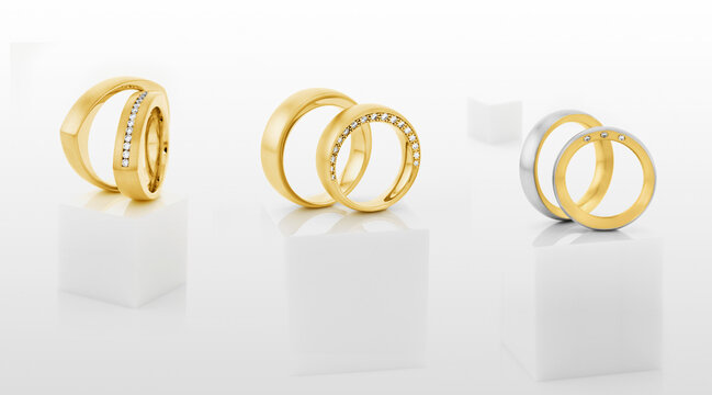 Still life of wedding rings on a white pedestal