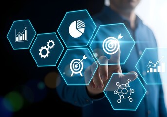 Business man touching a digital interface with business icons