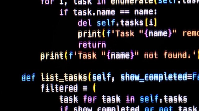 Developer software programming python code with chat bot AI. HTML code on lcd screen. Developer working on source codes on computer at office. Modern technologies, web design. Python programming