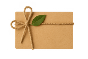 Kraft paper blank card or tag with twine bow and green leaf, symbolizing natural eco friendly message concept on transparent background