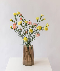 Fresh Carnation Flowers in Glass Vase on Minimalist White Background