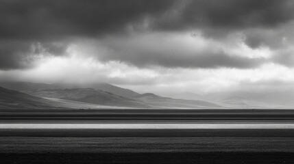Dramatic storm clouds over monochrome mountain landscape panorama. AI generative