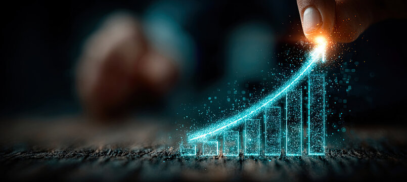 Hand pushing digital bar chart for business growth