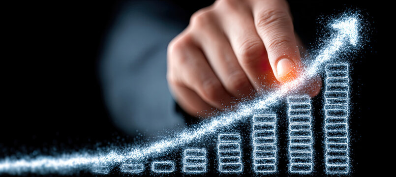 Hand touching glowing growth chart with increasing bars