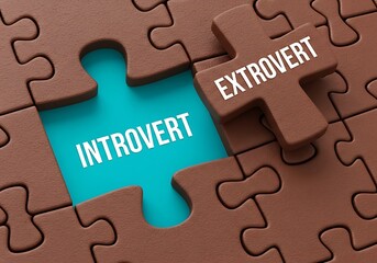 A chocolate puzzle with a missing piece revealing a bright teal background and the contrasting words introvert and extrovert