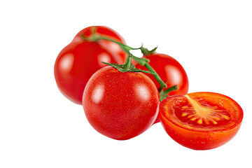Close-up of fresh, vibrant red cherry tomatoes, one halved, on a black background