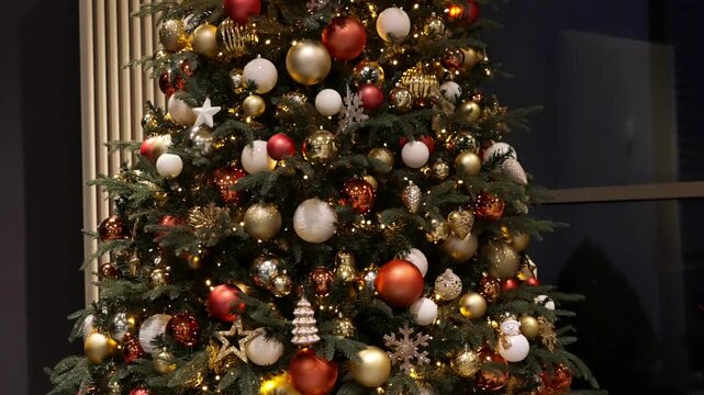 Slow Motion Shot of Fully Decorated Christmas Tree with Lights