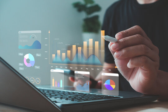 Businessman analyzing data and stock market visualization with digital charts, financial dashboards, and performance metrics. Ideal for investment analysis, trading strategy and economic forecasting.
