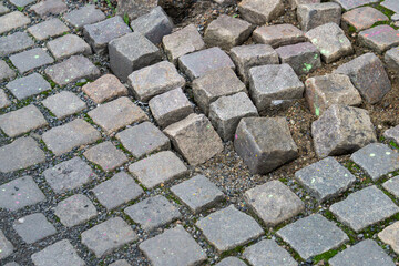 Cobblestone Pavement Repair: Dislodged Granite Pavers Construction Site Detail