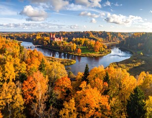 Obraz premium Picturesque aerial view of Turaida Castle and Gauja river valley in autumn season