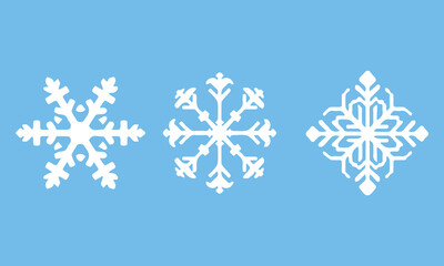 Fototapeta premium Trio of Stylized White Snowflake Icons on a Solid Light Blue Background – A Collection of Diverse Winter Symbols and Geometric Shapes Representing Frost, Ice, Cold Weather, and Holiday Season Decorati