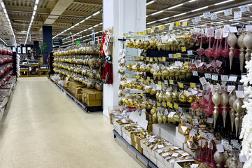Preparation for Christmas and New year winter holiday concept. Sale of Christmas balls and decorations in shopping mall. Store of Christmas symbols and accessories.