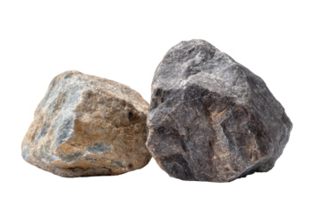 Two rough, uneven rocks, light tan and dark gray,  against a black background