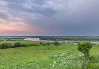 Beautiful landscape with a river and a tree