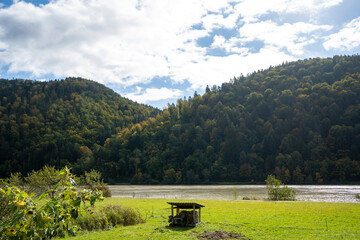 Beautiful autumn landscape with lake and mountains in the background, Slovakia