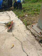 November 20, 2025: a lawn mower blade filled with binding weeds.