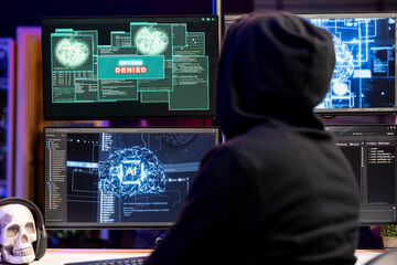 Cybercriminal seeing access denied warning on computer display when hacking firewalls. Rogue...