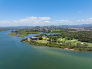 Elevated aerial sunset views of  the Tweed River inlet with the Coolangatta and Tweed Heads Golf...