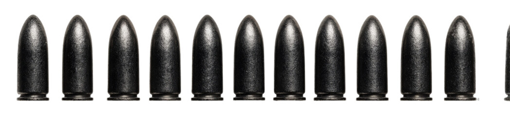 A row of dark gray, pointed projectiles