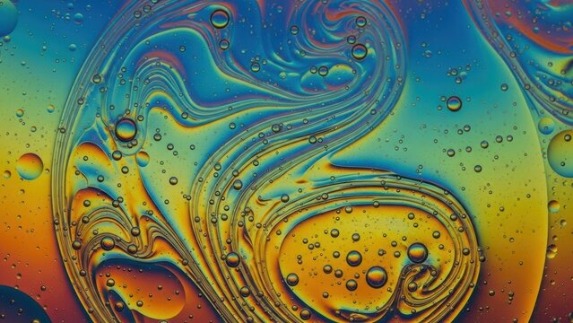 A colorful abstract background of oil and water bubbles forming swirling patterns. - Powered by Adobe