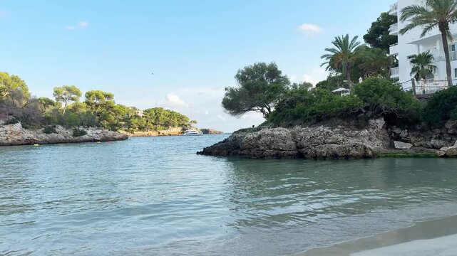 Cala Ferrera bay on Mallorca island panoramic view. Evening on the empty beach in Spain.