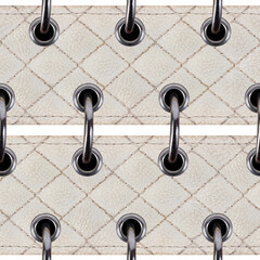 Seamless isolated photo of white colored leather quilted straps with stitch patterns and clasps.