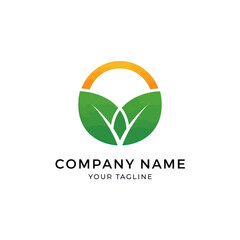 Circular nature logo with green leaves and a golden sun arc.