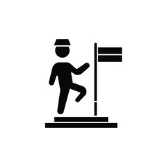 A black silhouette of a person climbing steps towards a flag, symbolizing achievement and success.