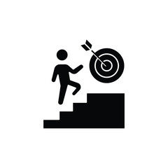 A person climbing stairs towards a target, symbolizing ambition and goal achievement.