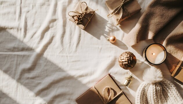 Curated holiday gift collection arranged on luxurious cream bedding with elegant top picks 2025 typography