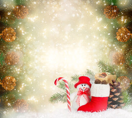 Christmas background with Snowman in hat, decorative Santa's red boot, candy cane, branch and pine cones for tree decoraton. Winter holidays fantasy card with decor and copy space, festive postcard.