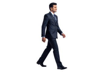 Confident businessman in a dark suit walking with purpose.
