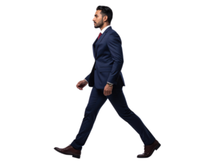 Confident young businessman walking with purpose in a professional suit.