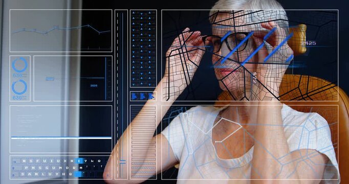 Seated woman raising hands and adjusting eyeglasses while starting AR face scan for testing fit