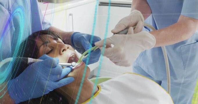 Operator inserting handpiece, dental team cleaning teeth, animated graphics overlaying frames