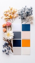 A flat lay composition featuring dried flowers in various colors and textures alongside a grid of six color swatches.