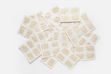 Mustard plasters on white background