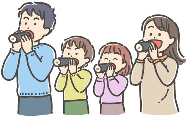 節分の恵方巻（太巻き）寿司を食べる4人家族
