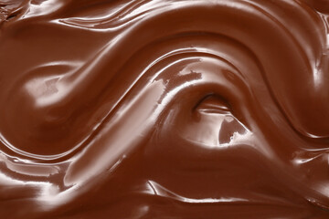 Melted milk chocolate as background