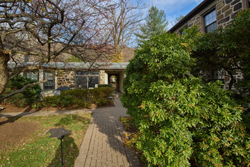 Garden in the fall with a stone building