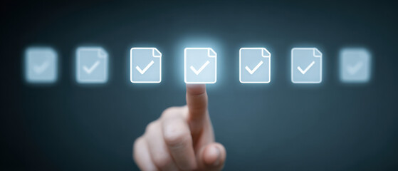 Checklist Completion A Finger Tapping a Document with a Tick