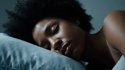 Peaceful Black Woman Sleeping Soundly in Bed, Close-up of Her Face as She Rests