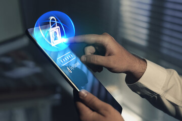 Password required to sign in. Man using tablet computer, closeup. Cyber security and data protection concept