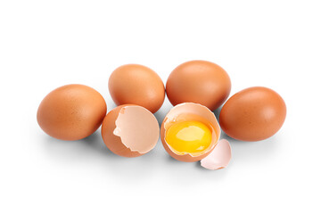 Many brown chicken eggs on white background