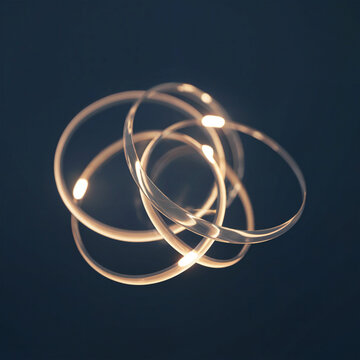 El nudo de la conexi&oacute;n: Anillos luminosos y entrelazados que simbolizan la conexi&oacute;n global y la tecnolog&iacute;a
