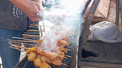 Traditional Sate Ayam being Cooked on Skewers | Smoking Barbecue of Indonesian Street Food |...